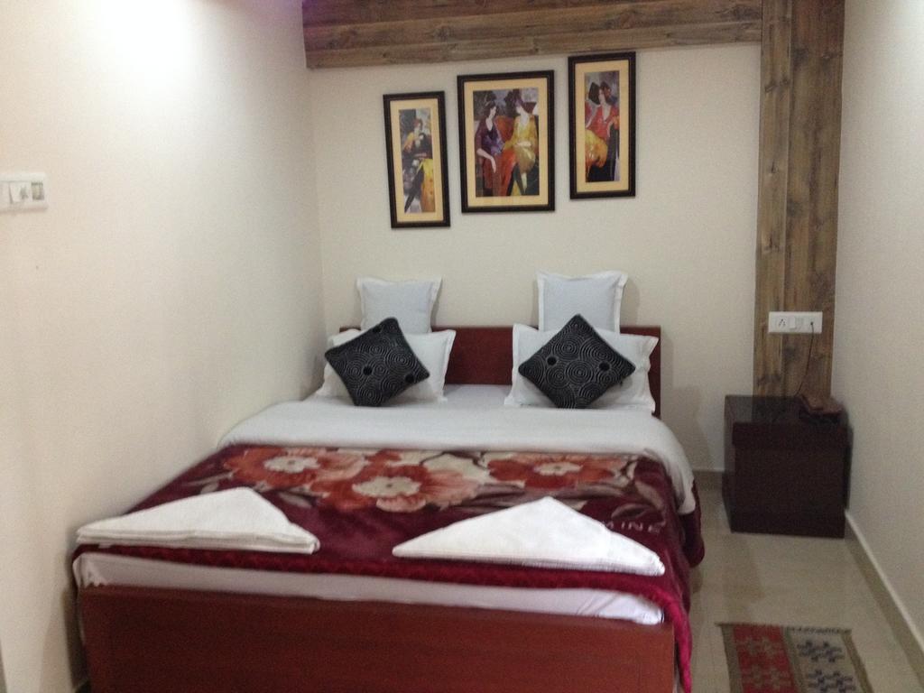 Breeze Hotel Siliguri Rum bild